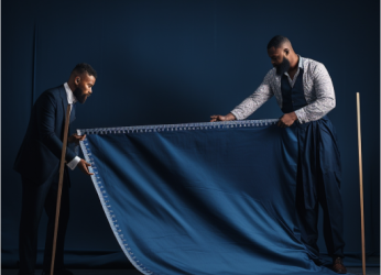 men measuring a cloth